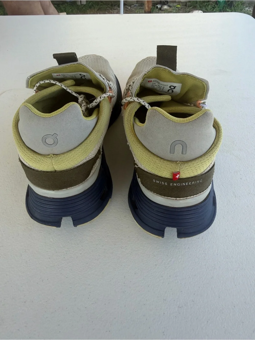 Light Neutral Athletic Sneakers with Navy Sole and Peach Accents